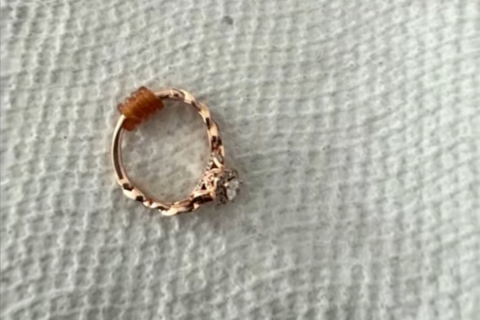 The dog finally released the piece of jewelry after which it was, of course, thoroughly cleaned.