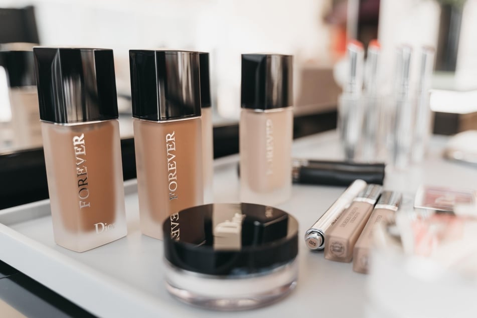 Liquid makeup stains should be treated with shaving cream or a laundry detergent and dish soap mixture.