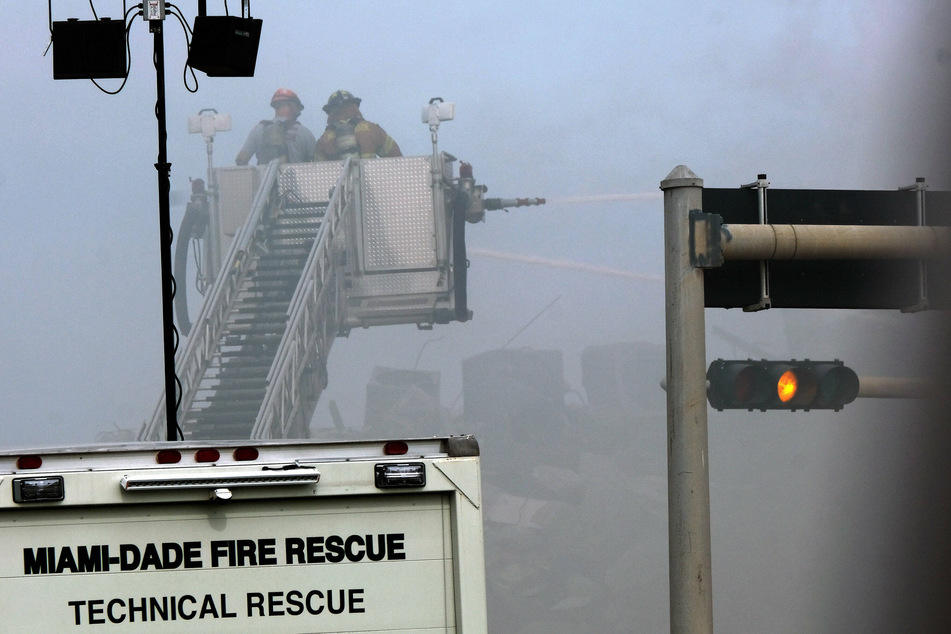 Authorities have had to battle fires at the site of the collapse.
