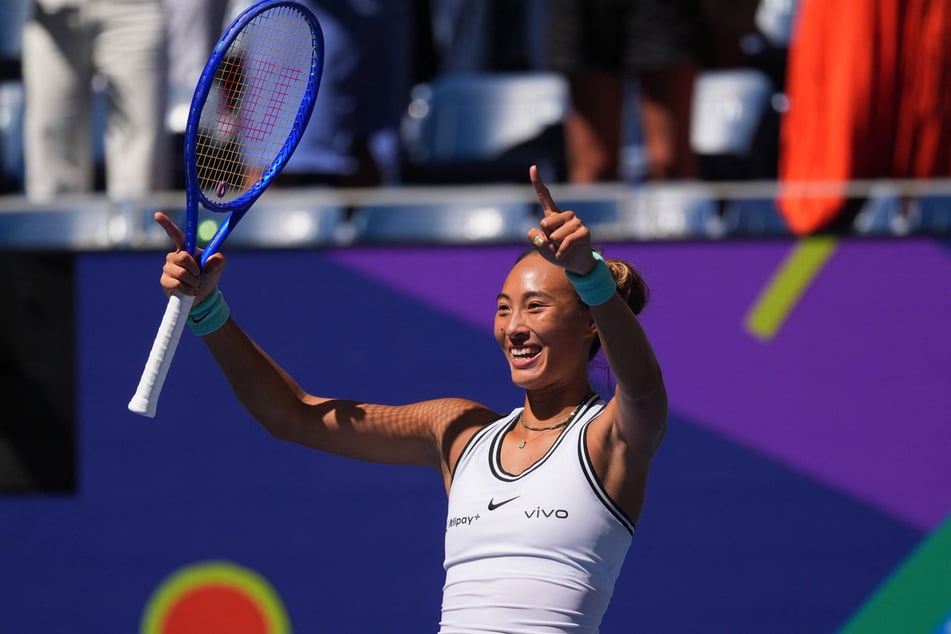 China's Qinwen Zheng celebrates after winning her US Open round of 16 match against Poland's Iga Swiatek on September 7, 2026.