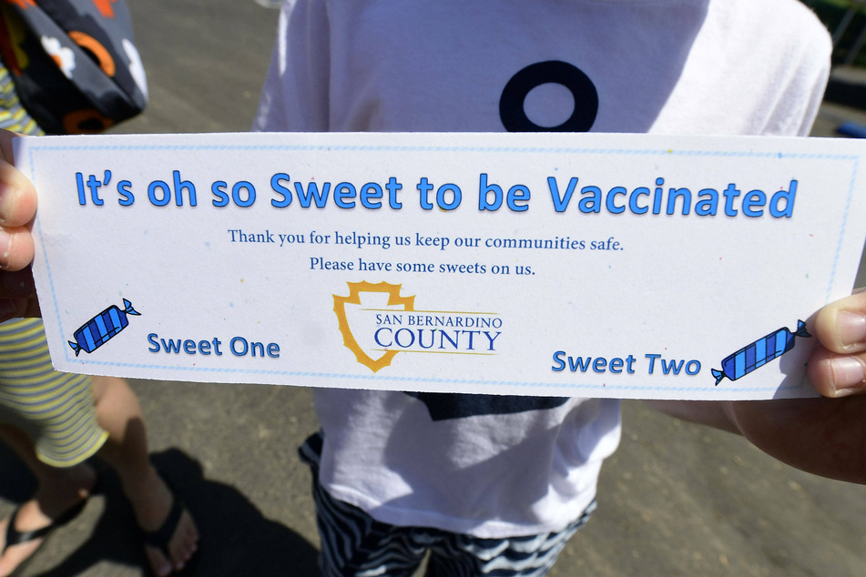 All who received a shot of the Johnson & Johnson Covid-19 vaccine at Nunez Park in San Bernardino on Saturday received their choice of a churro or shaved ice treat.