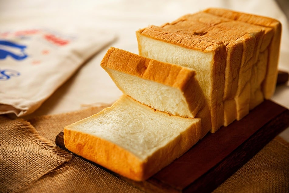 Sometimes, dabbing a makeup stain with bread can effectively remove the color from the stain.