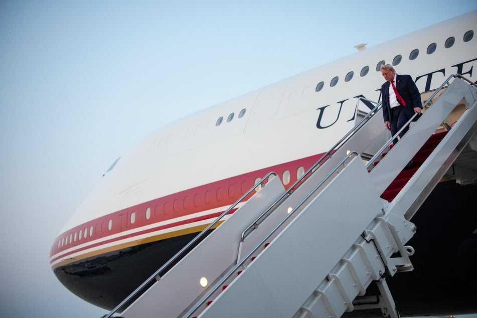 President Donald Trump steps off Air Force One, having returned from attending the FIFA World Cup Final on July 19, 2026.