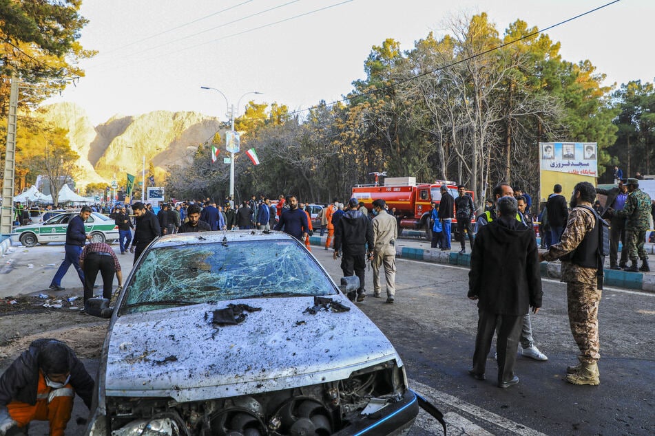 Two attackers detonated their suicide vests as crowds gathered to commemorate Soleimani on Wednesday.