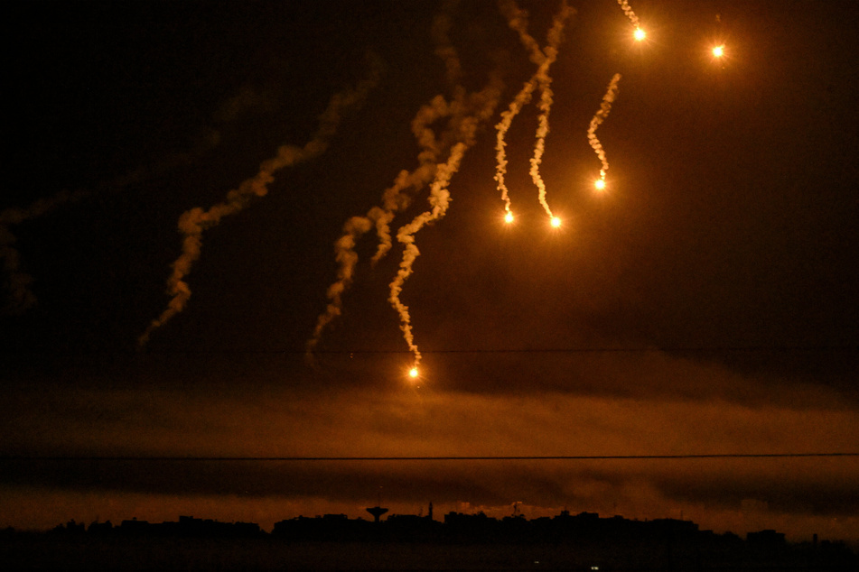 A photo from the Israeli border with the Gaza Strip showed flares above the Palestinian enclave on Tuesday.