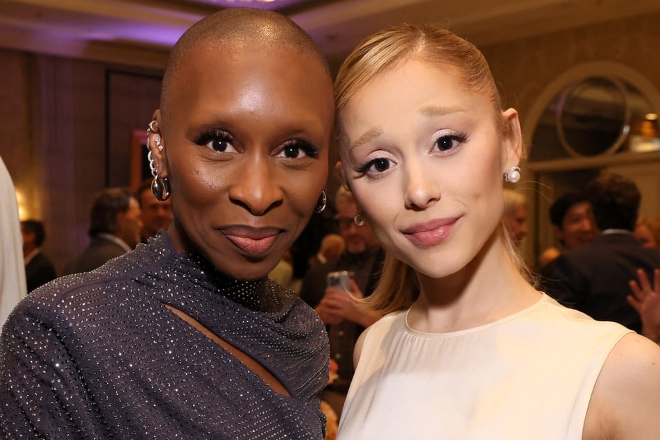 Cynthia Erivo (l.) poses for a photo with Ariana Grande. The British singer and actor defended her friendship with the pop star in a recent interview.