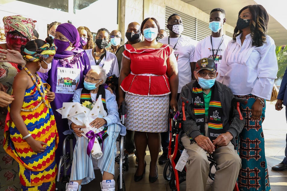 Viola Ford Fletcher, Hughes Van Ellis, and family members are received by the deputy director of diaspora affairs at the Kotoka International Airport in Accra, Ghana, on August 14, 2021.