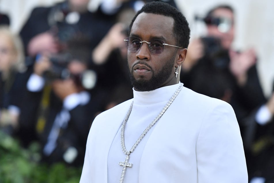Diddy made a rare public appearance with his twin daughters in Miami after his homes were raided by Homeland Security Investigations.
