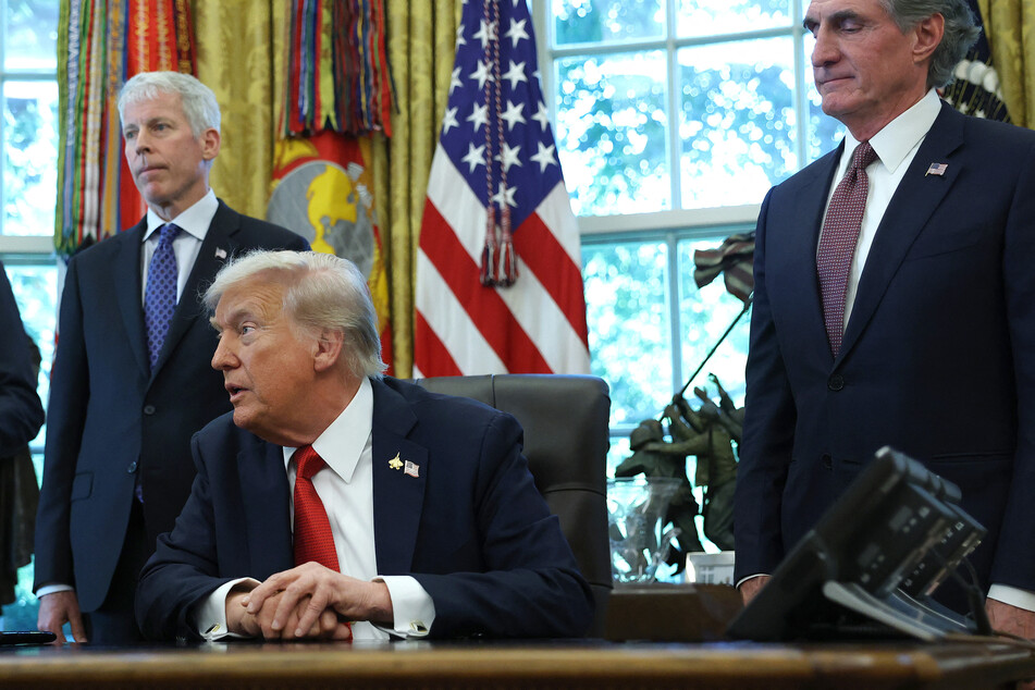 President Donald Trump hinted at potentially invoking the Insurrection Act as he doubled down on his authoritarian takeover of Democratic-led cities.