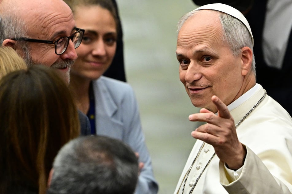 Pope Leo XIV gestures during an audience to representatives of the media, at Paul-VI hall in The Vatican, on Monday.