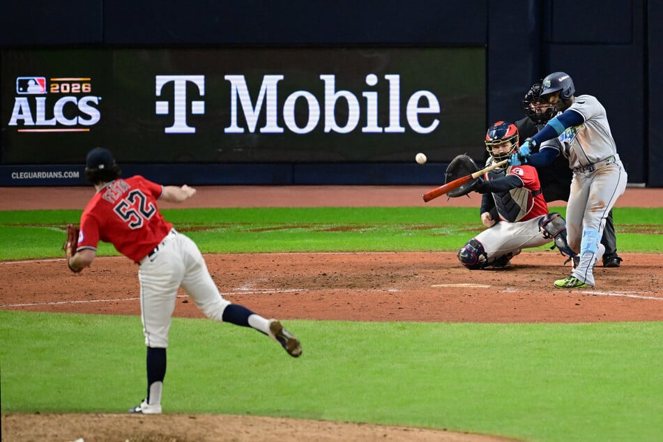 Tampa Bay Rays designated hitter Yandy Diaz hits a two-run home run against Cleveland Guardians pitcher Matt Festa during the ninth inning in game four of the ALCS.