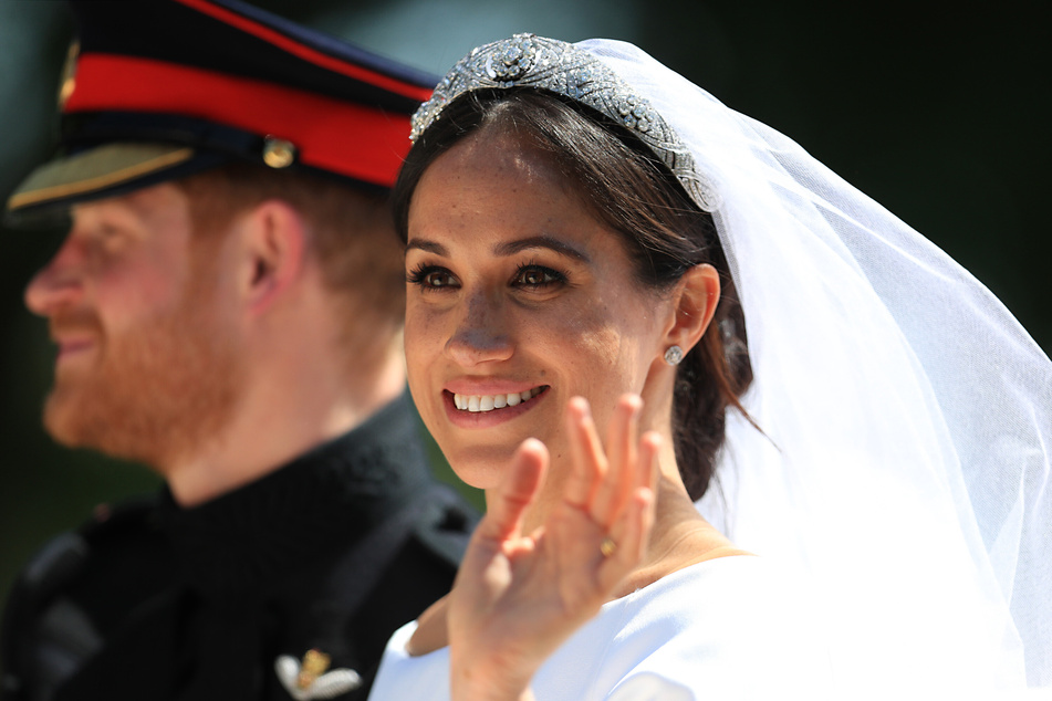 At her wedding to Prince Harry (l.), Meghan wore a diamond tiara that was made for Queen Mary in 1932.