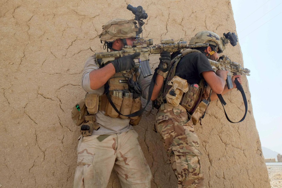 Afghan security force members are still fighting Taliban militants.
