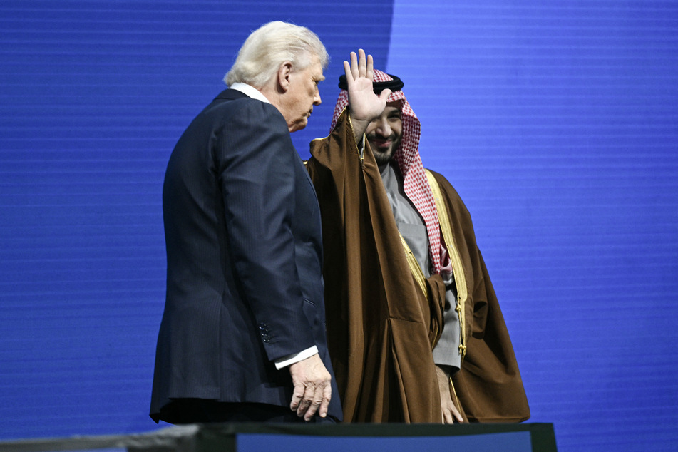 President Donald Trump (l) and Saudia Arabia Crown Prince Mohammed bin Salman (r) speak during an investment forum in November, 2025.