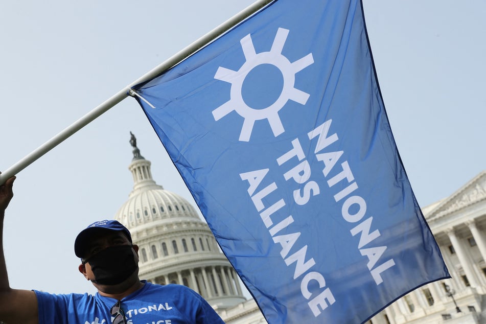 Supporters of the National TPS Alliance, a grassroots immigrants' rights organization, rally at the US Capitol.
