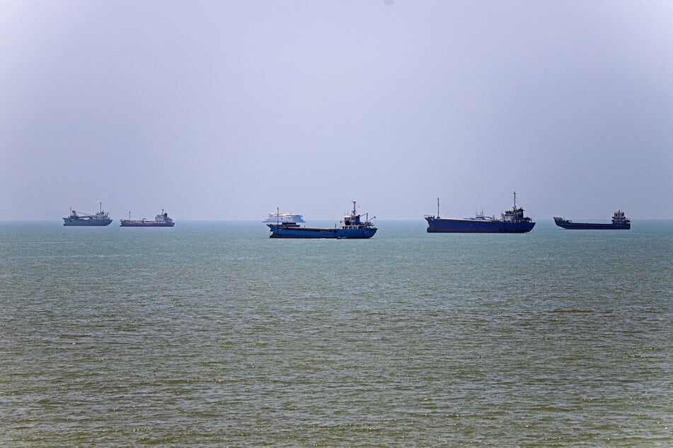 In this picture obtained from Iran's ISNA news agency on June 18, 2026, vessels are seen anchored in Bandar Abbas along the Strait of Hormuz.