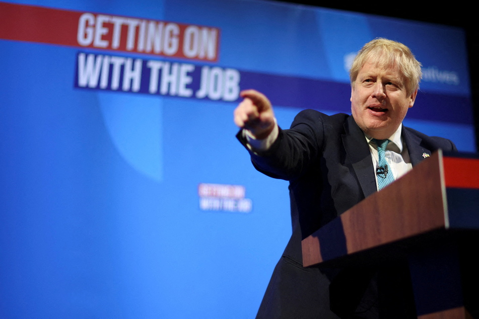 British Prime Minister Boris Johnson gestures during the Conservative Party Spring Conference in Blackpool, Britain, March 2022. REUTERS/Phil Noble