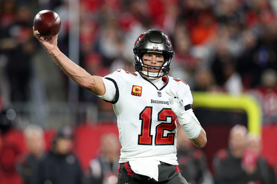 Tampa Bay Buccaneers quarterback Tom Brady completed 35 attempts for 351 yards, two touchdowns, and one interception against the Dallas Cowboys.