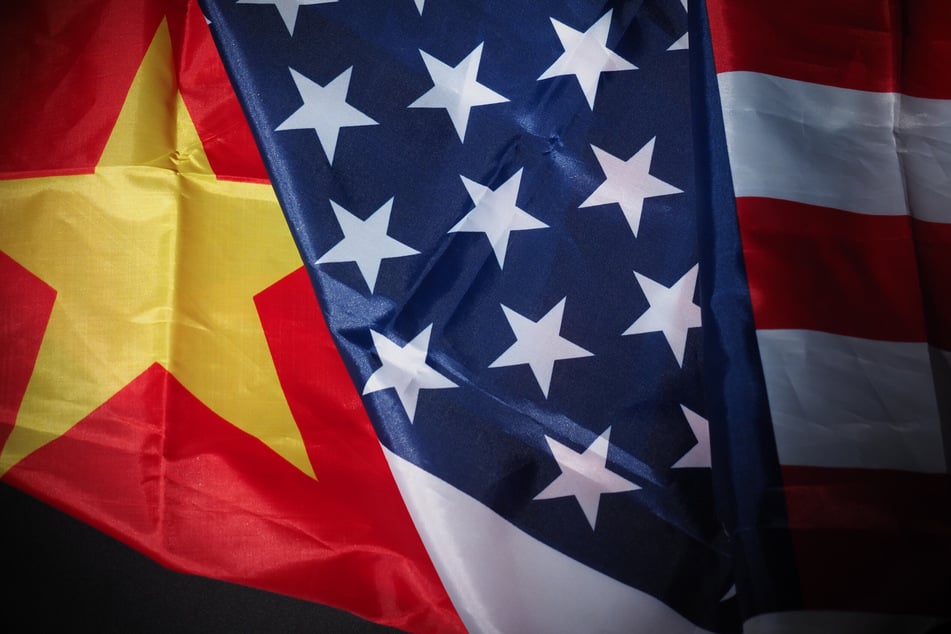 A US Navy officer has been sentenced to more than two years behind bars for providing military intelligence to China.