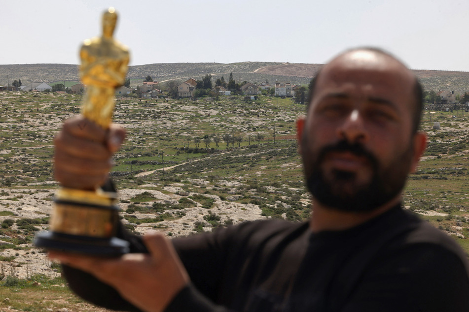 Hamdan Ballal recalled hearing Israeli soldiers reference his Oscar win as they detained him.