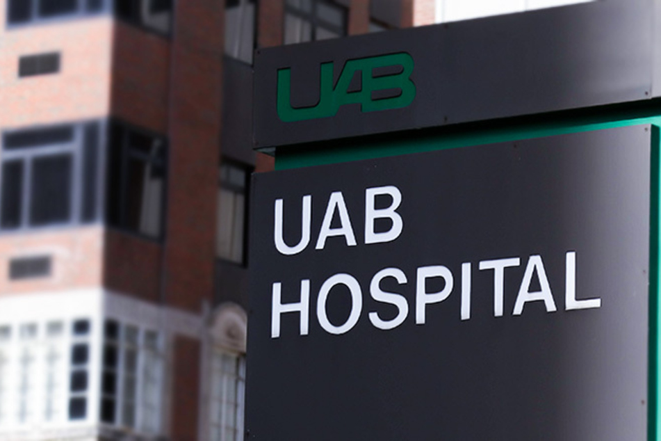 Hospital workers protest poor pay amid "tremendous pressure" from Covid-19 surge
