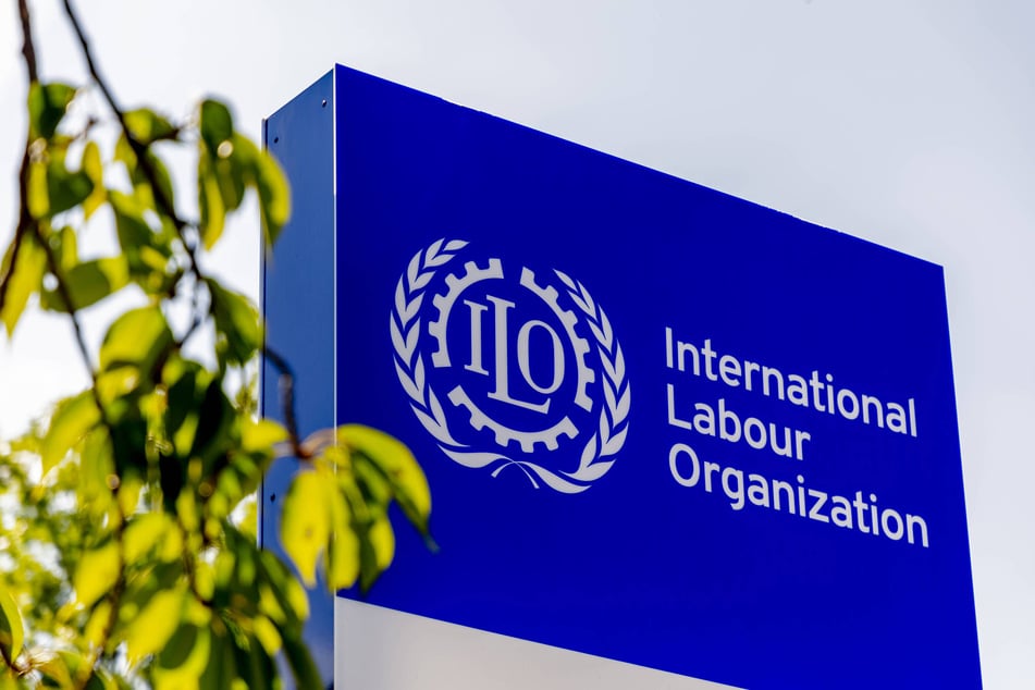 Signage for the International Labor Organization is pictured outside the entrance to the headquarters in Geneva, Switzerland.
