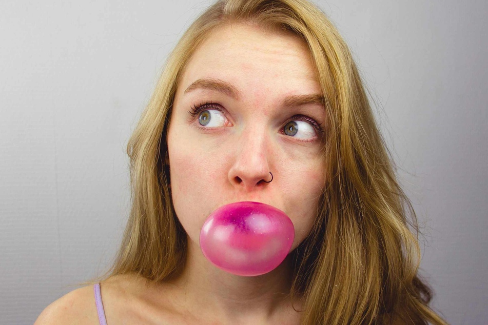 Chewing gum releases hundreds of tiny plastic pieces straight into people's mouths, researchers said this week, also warning of the pollution created by the rubber-based candy.