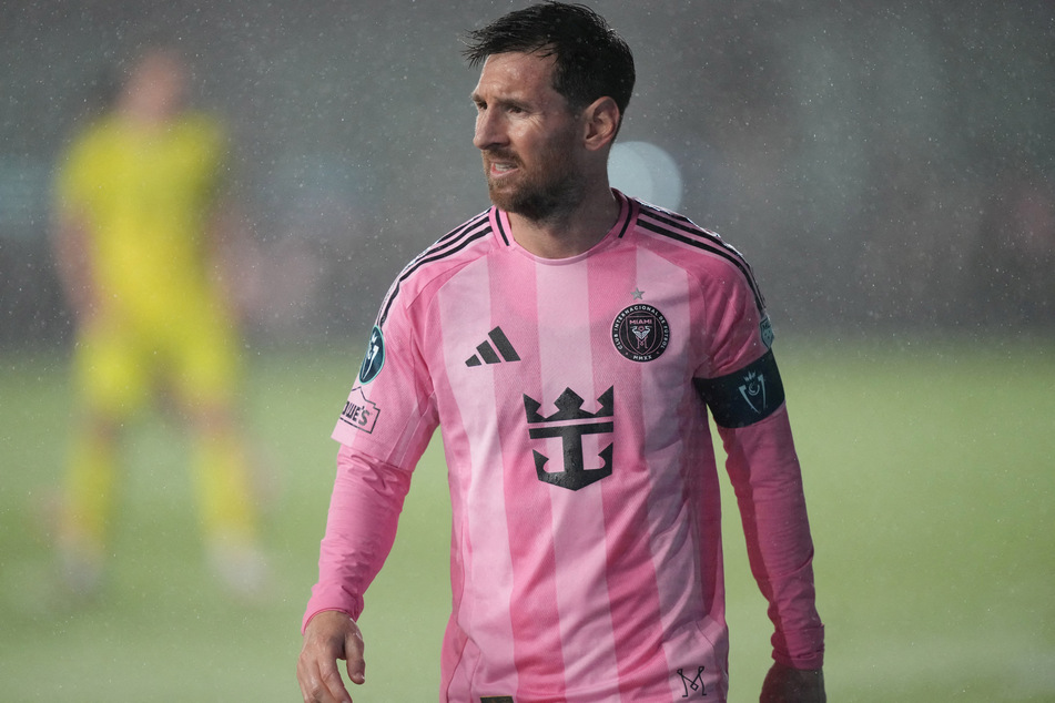 Inter Miami forward Lionel Messi walks over to take a corner kick against Nashville SC during the first half at Chase Stadium on March 18, 2026.