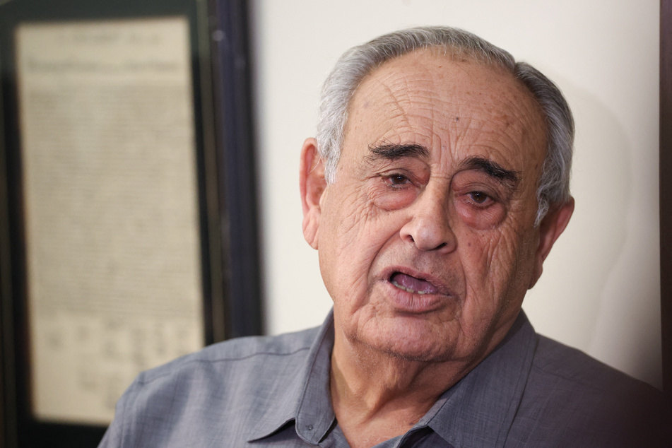 Car wash owner Rafie Ollah Shouhed speaks at a press conference in Los Angeles, California, on September 25, 2025.
