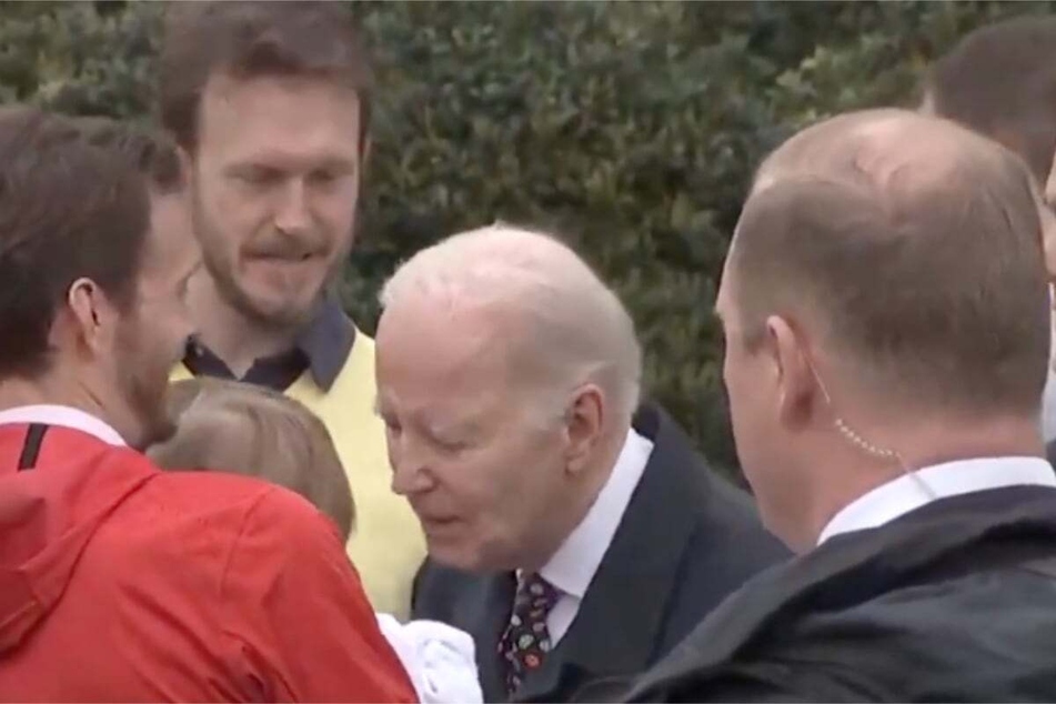 President Joe Biden was captured lingering with a young guest at the Easter event at the White House on Monday.