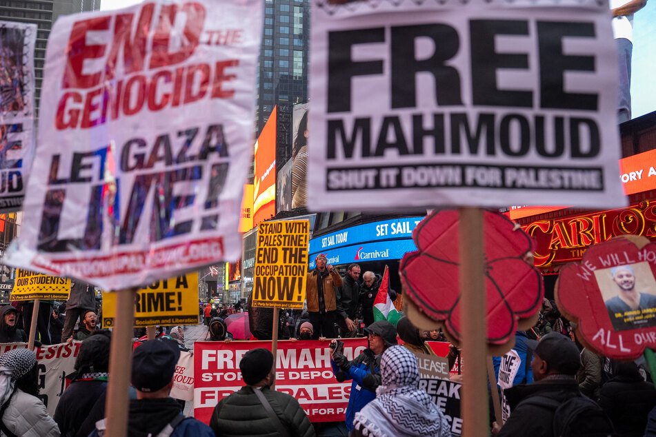 Demonstrators gather in Times Square to demand the release of detained Columbia University graduate student Mahmoud Khalil and an end to Israel's atrocities in Palestine.