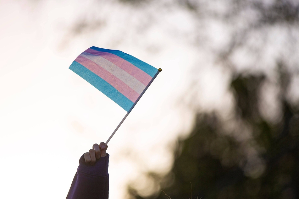 The US Justice Department is taking on Tennessee Republicans with a new challenge to their ban on gender-affirming care for trans and non-binary youth.