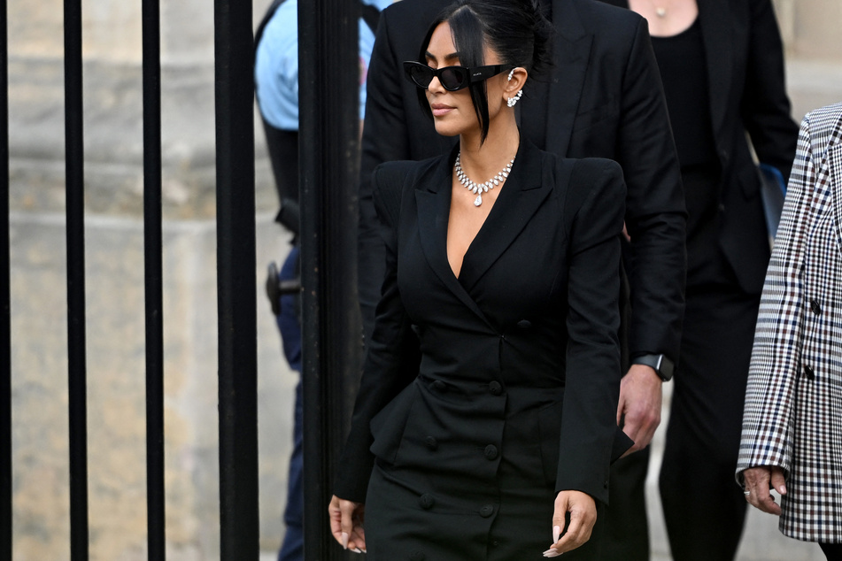 Kim Kardashian donned an all-black ensemble as she testified in Paris on Tuesday.