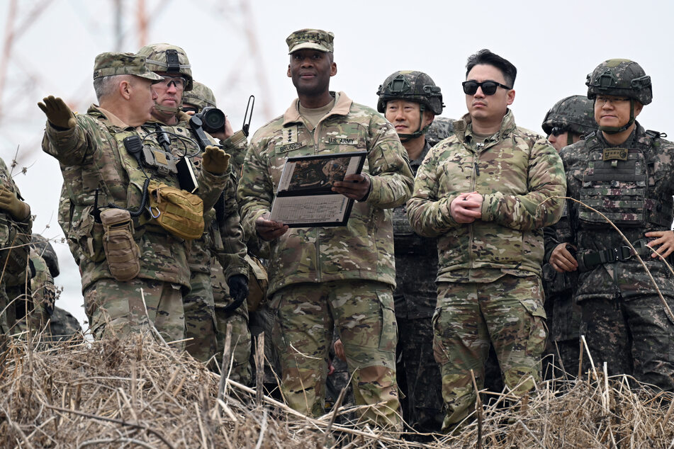 General Xavier T. Brunson (c.), commander of the US Forces Korea, United Nations Command and Combined Forces Command, visits to watch a combined maneuver training with wet gap crossing during the 2026 South Korea-US Freedom Shield military exercise in Yeoncheon on March 14, 2026.