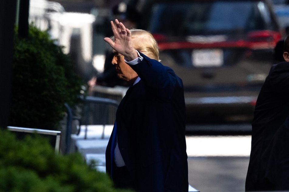 Donald Trump returns to Trump Tower from Manhattan Criminal Court following opening statements in his hush money trial.