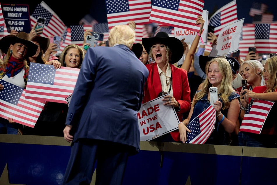 President Donald Trump interacts with supporters at the Republican National Midterm Convention in Dallas, Texas, on September 9, 2026.
