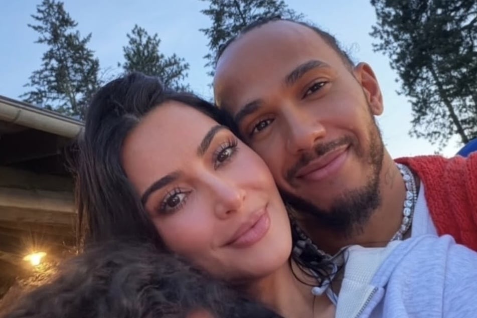 Kim Kardashian has Lewis Hamilton (r) in her corner as she continues grieving her late grandmother.