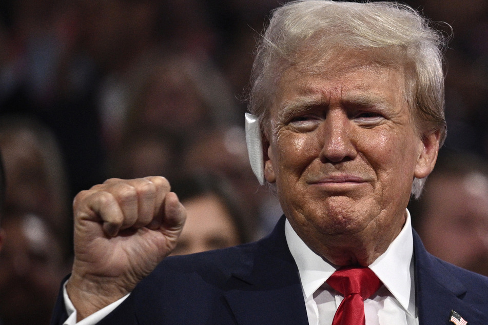 Emotional Trump receives gushing reception at RNC in first appearance since assassination attempt