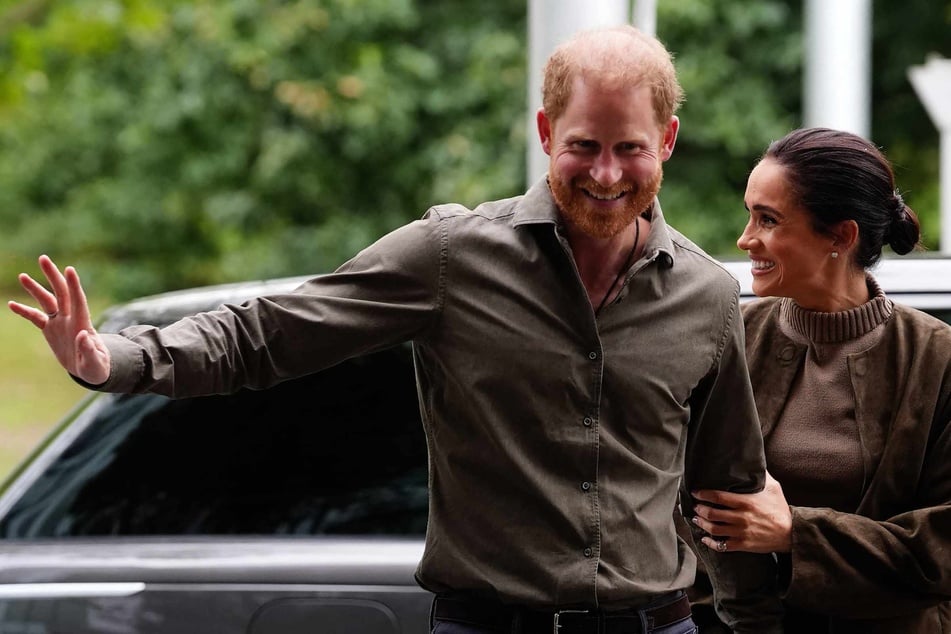 Prince Harry (L), his wife Meghan (R), and their two children landed Wednesday in Britain, UK media reported, after the shock news emerged last week they would be relocating from the US.