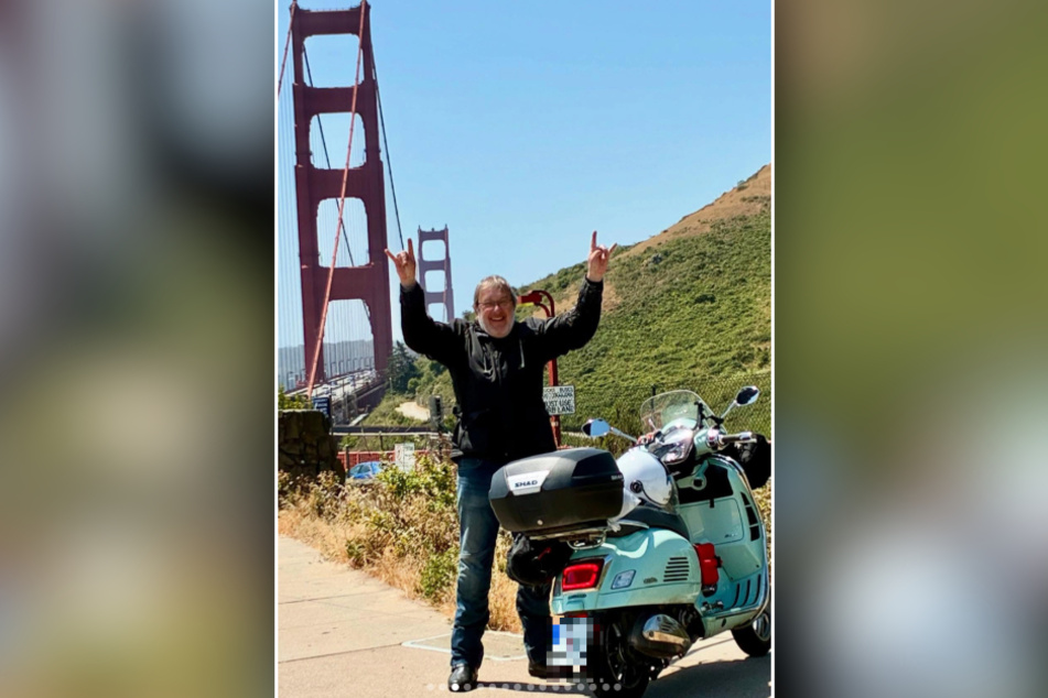 Bernd Rippert and his Vespa at the Golden Gate Bridge.