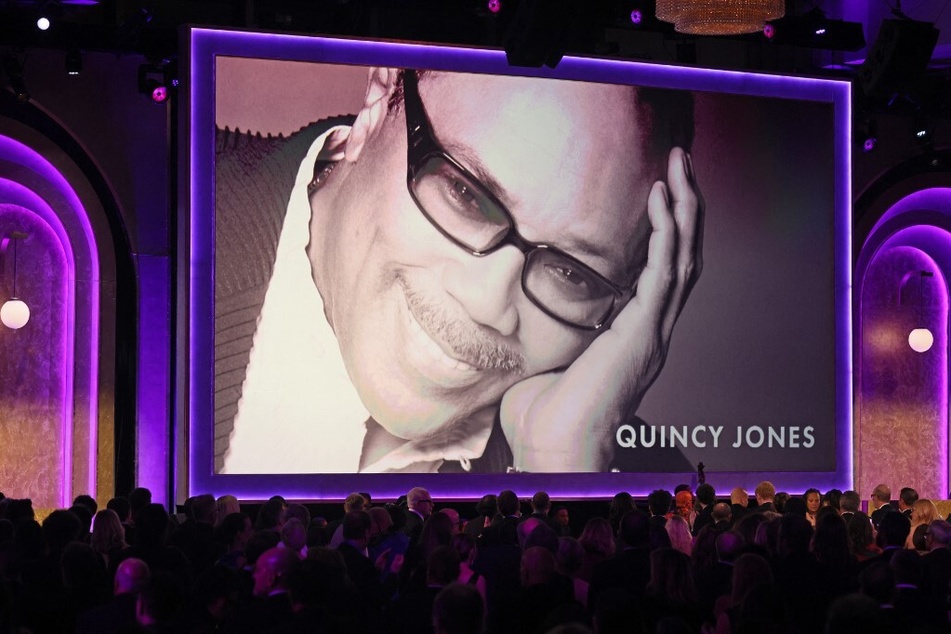 The late Quincy Jones appears on screen as he receives an honorary award during the Academy of Motion Picture Arts and Sciences' 15th Annual Governors Awards in Los Angeles, California.