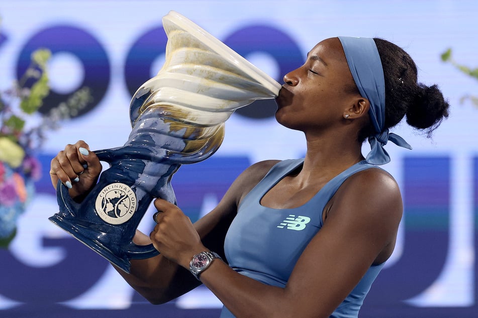 Coco Gauff poses with the Rookwood Cup winning the Women's Final of the Cincinnati Open on August 23, 2026.