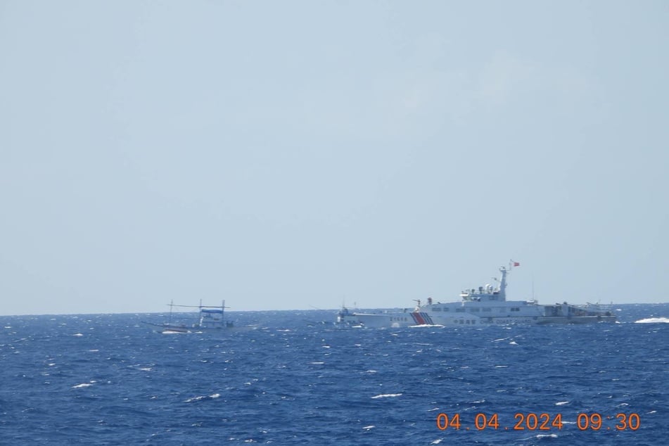 The Chinese Coast Guard reportedly fired water cannons at two Filipino vessels in the disputed South China Sea on Tuesday.