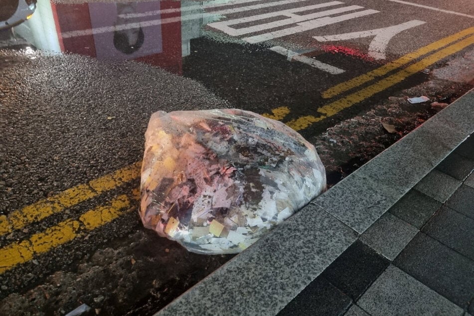 A plastic bag carrying various objects including what appeared to be trash that crossed the South Korean border with a balloon believed to have been sent by North Korea.