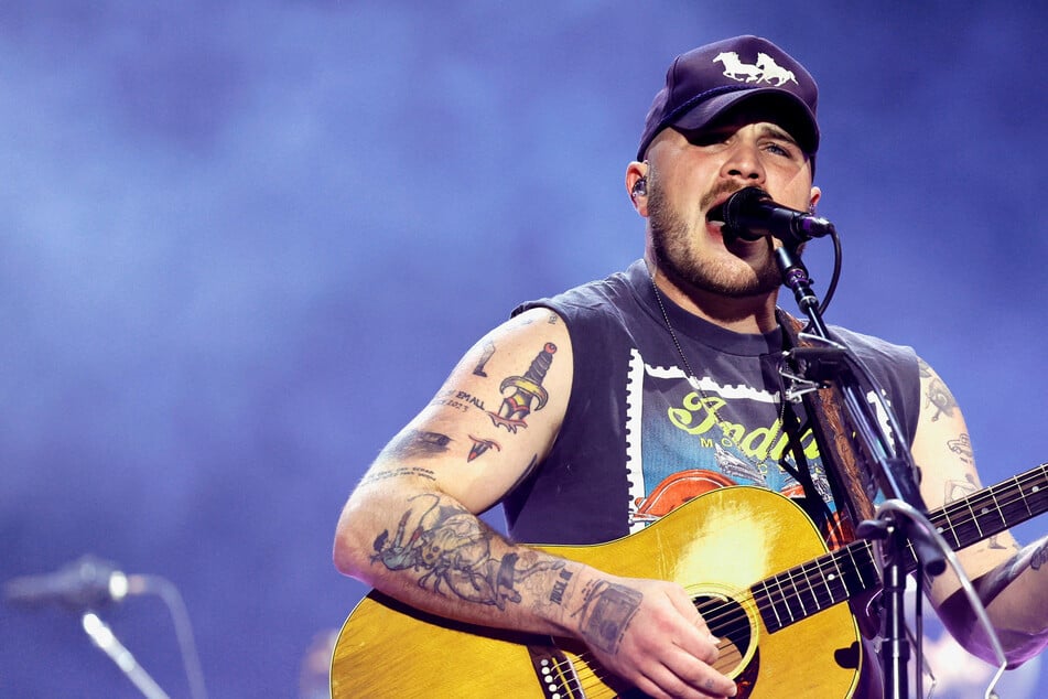Zach Bryan wears "Free Palestine" shirt in major dig at Robert Kraft after Macklemore drama