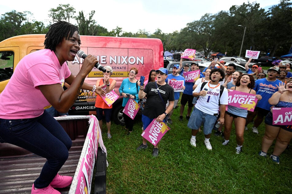 Angie Nixon speaks while campaigning on the campus of the University of Florida in Gainesville on September 5, 2026. She is urging people to support her challenge to Republican Senator Ashley Moody. 