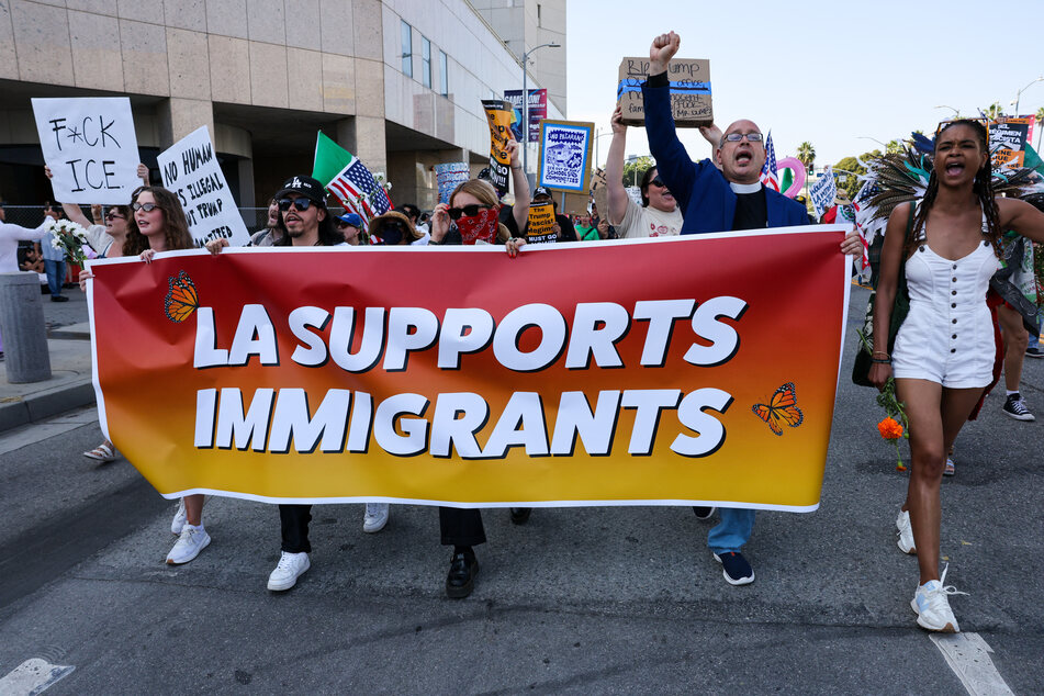 Protesters demonstrate outside of a federal building and Immigration and Customs Enforcement (ICE) detention center on June 13, 2025, in Los Angeles, California.