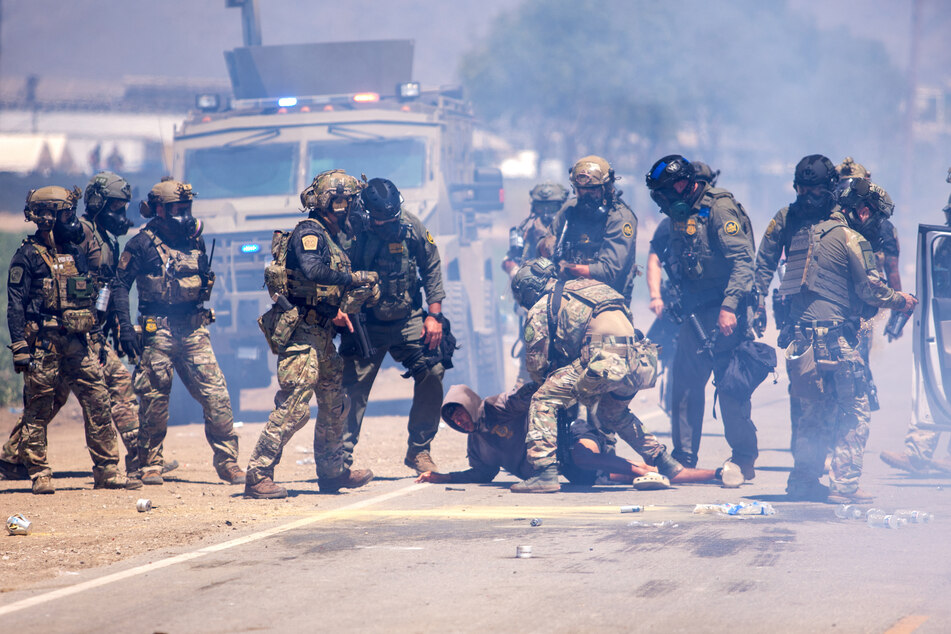 Raids on agricultural sites Thursday resulted in the arrests of 200 undocumented migrants and clashes between law enforcement officials and protesters.