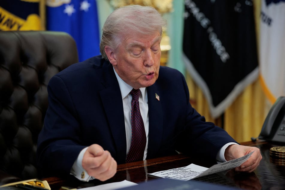 President Donald Trump speaks during the signing ceremony for an executive order on mail-in ballots, in the Oval Office of the White House on March 31, 2026.