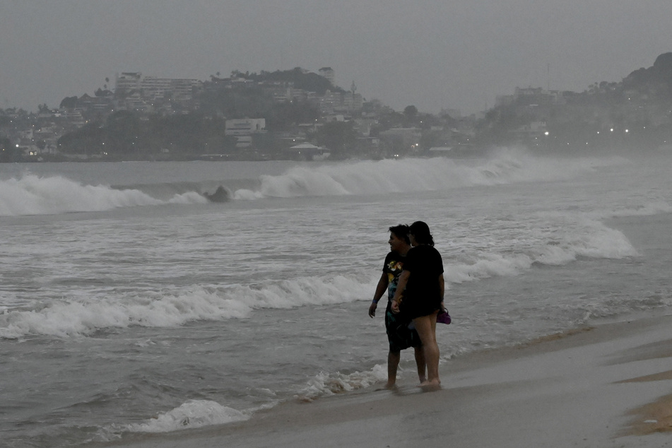 The Category 5 Hurricane Otis made landfall near Acapulco in Mexico, where there are warnings of potentially catastrophic damage.